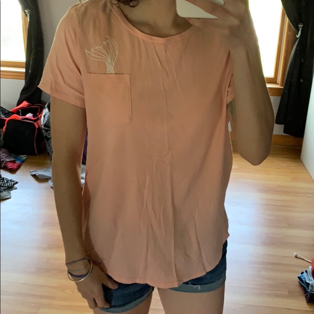 coral t shirt with mermaid detail